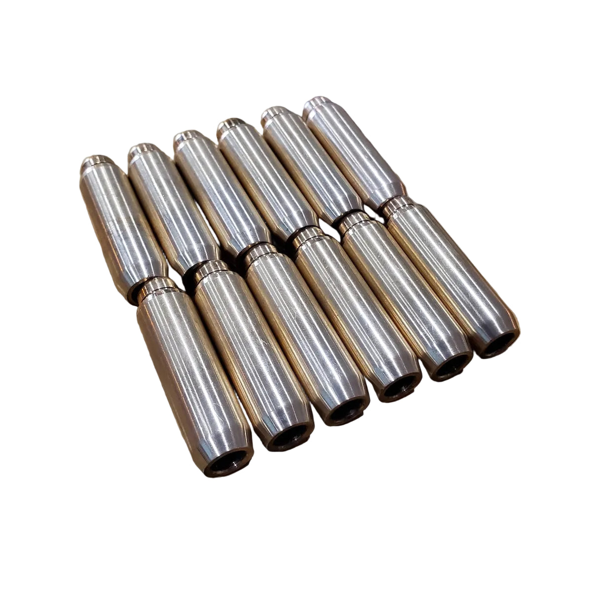 A set of 12 valve guides for a BMW M30 engine.