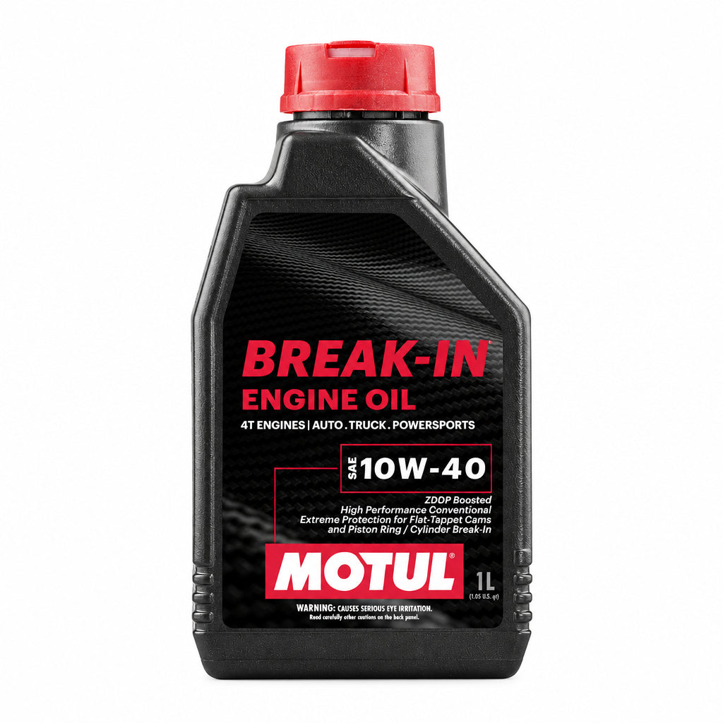 Motul 10W40 conventional break in oiil with high zinc content in 1L plastic bottle.