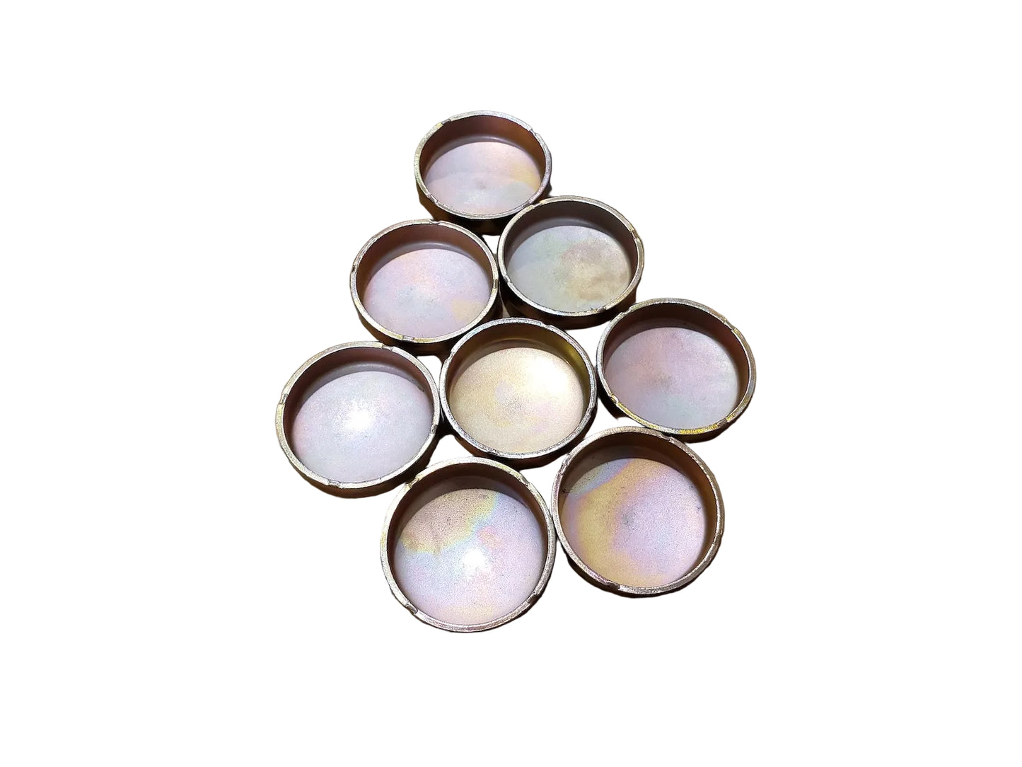 Set of eight freeze plugs for BMW M10 engines.