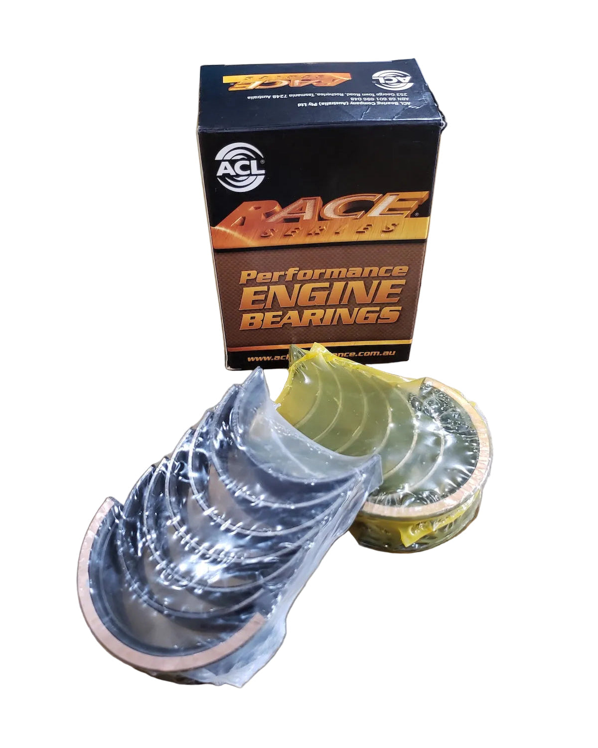 A set of ACL Race Series main bearings for BMW M20, S50, and S52 engines, displayed in front of its packaging box.