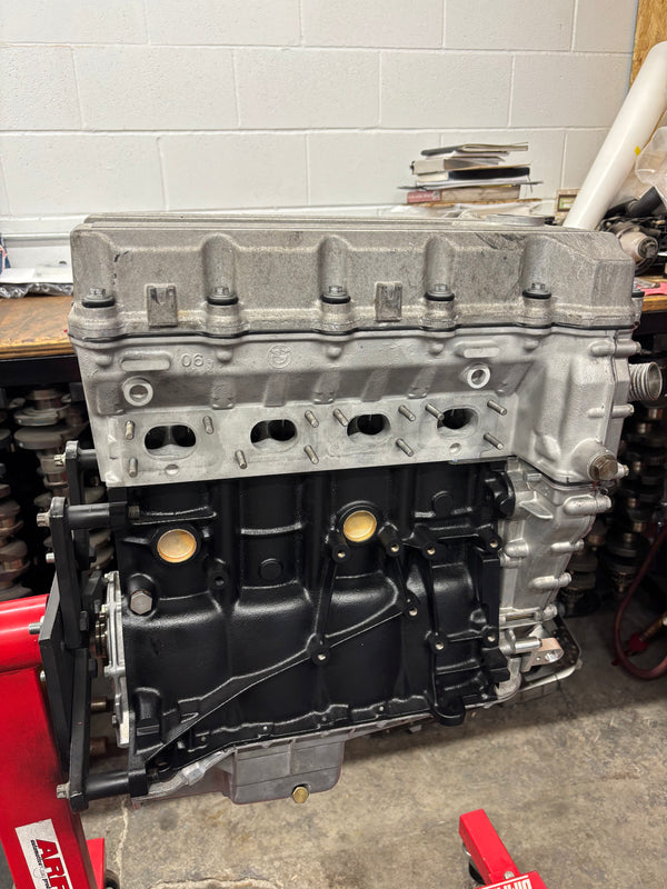 BimmerHeads built BMW M42 engine with forged pistons, ARP hardware, and upgraded valvetrain for boost.