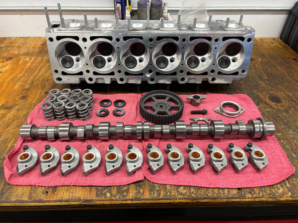 BimmerHeads BMW M20 885 Super Sport head and components ready for assembly.