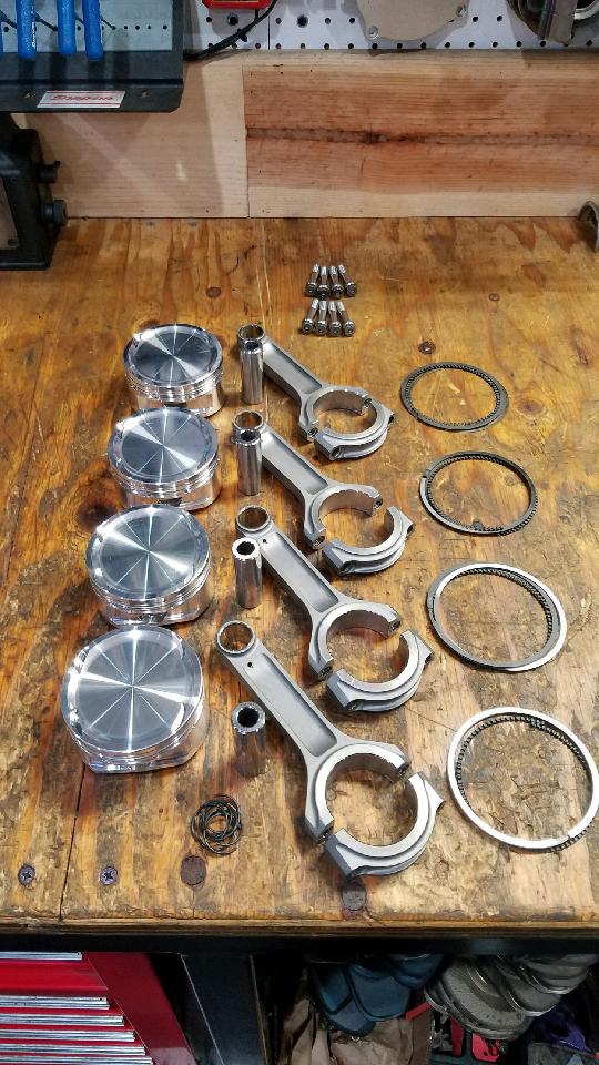 BimmerHeads BMW S14 E30 M3 forged pistons and titanium connecting rods.