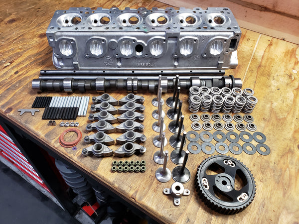 BimmerHeads M20 885 Race cylinder head and components with forged rocker arms, Supertech valves, and Nuke cam gear.