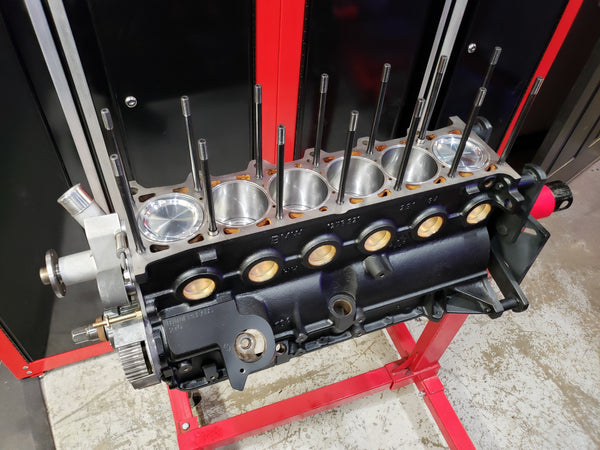 BimmerHeads built BMW M20 short block engine with CP forged pistons and ARP head studs.
