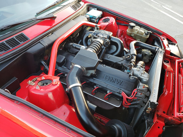 BimmerHeads built BMW M30 engine swapped into E30 chassis.