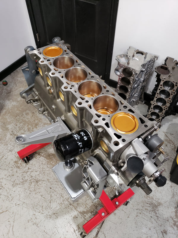 BimmerHeads stroker short block stroker engine with coated forged pistons.