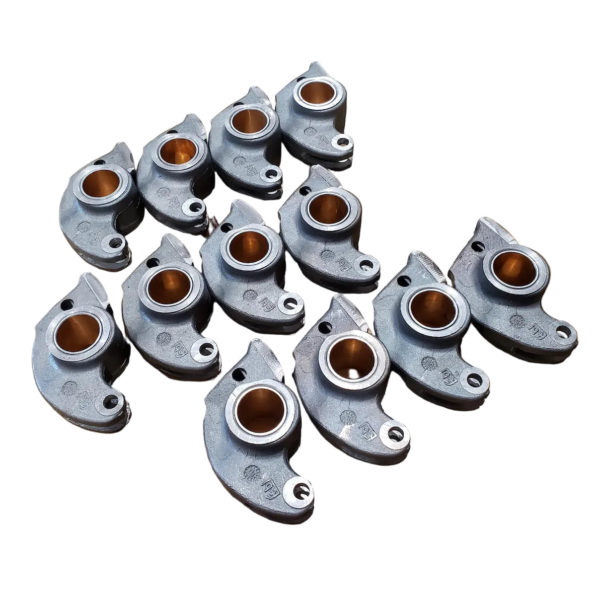 Set of 12 cast aluminum rocker arms made by Febi for BMW M20 engines.