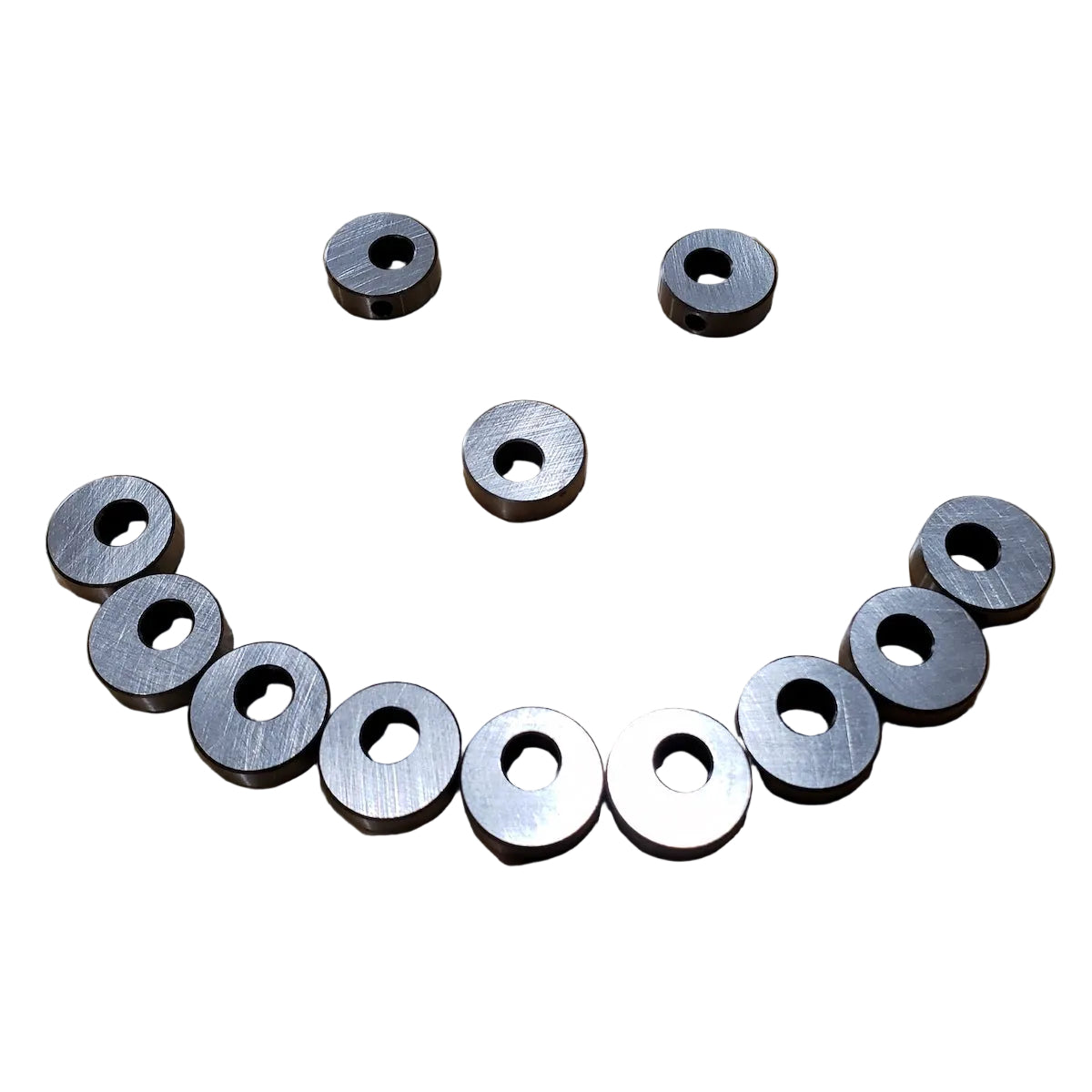 Set of 12 rocker arm eccentrics for BMW M20 and M30 engines.