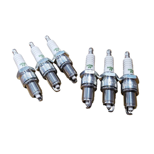 A set of six NGK V-Power spark plugs for BMW M20 engines.