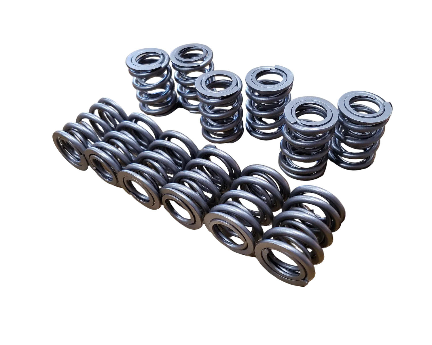 Set of 12 dual inner and outer performance valve springs by BimmerHeads for BMW M20 engines.