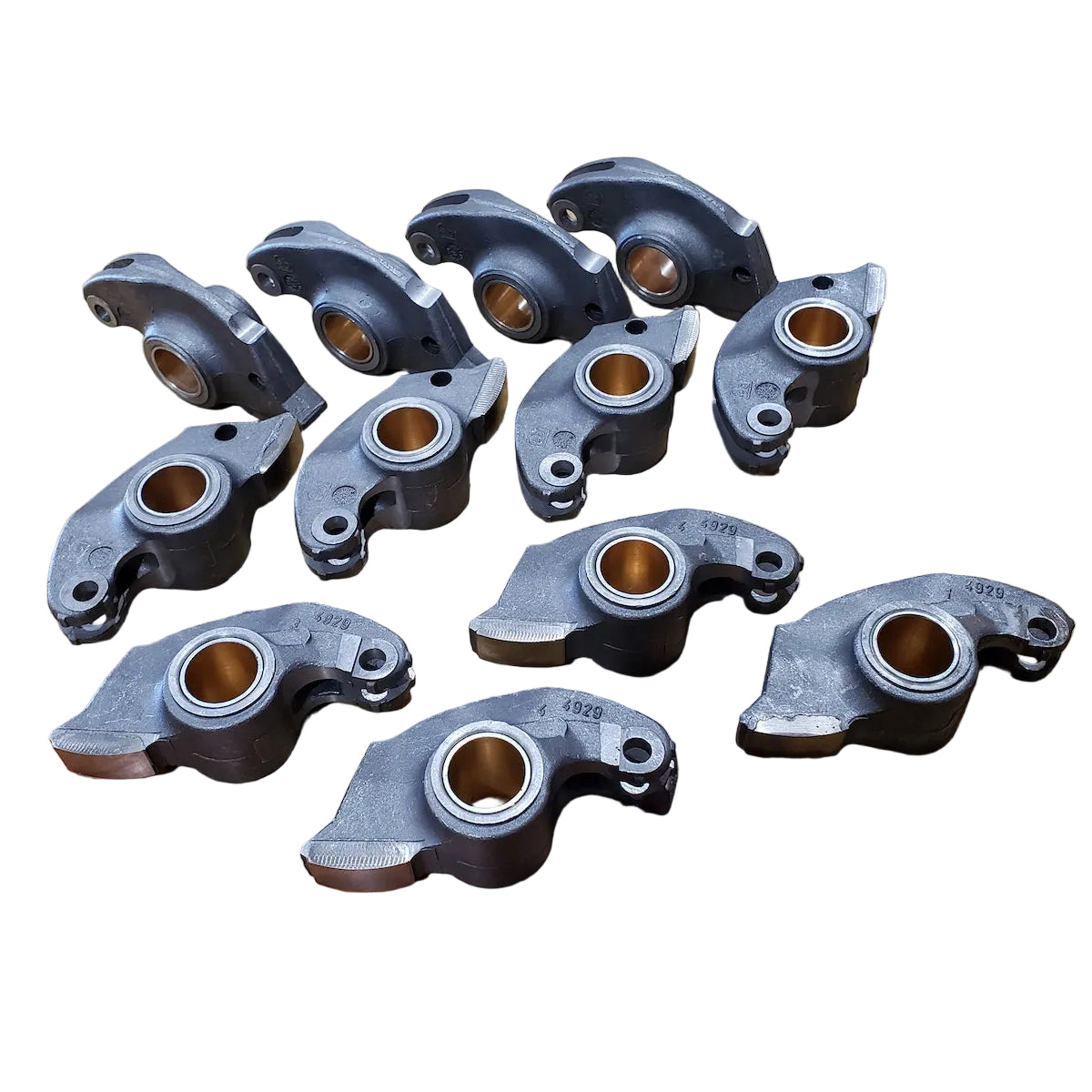 Set of 12 Febi cast aluminum rocker arms for BMW M30 engines.
