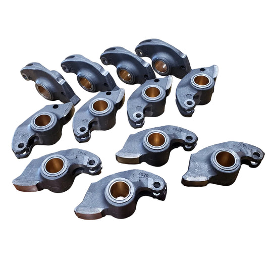 Set of 12 Febi cast aluminum rocker arms for BMW M30 engines.