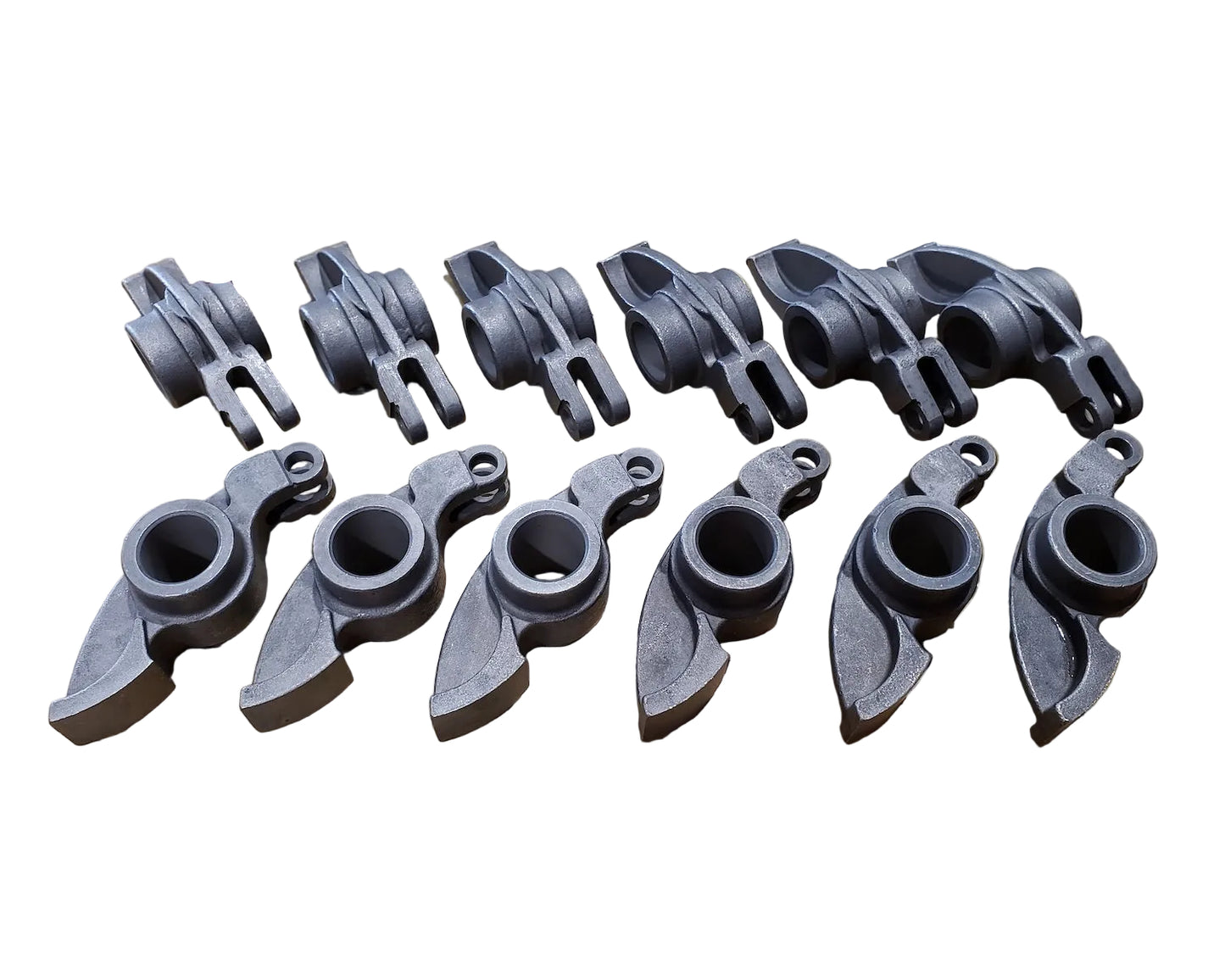 A set of 12 forged steel rocker arms for a BMW M30 engines made by KM Cams.