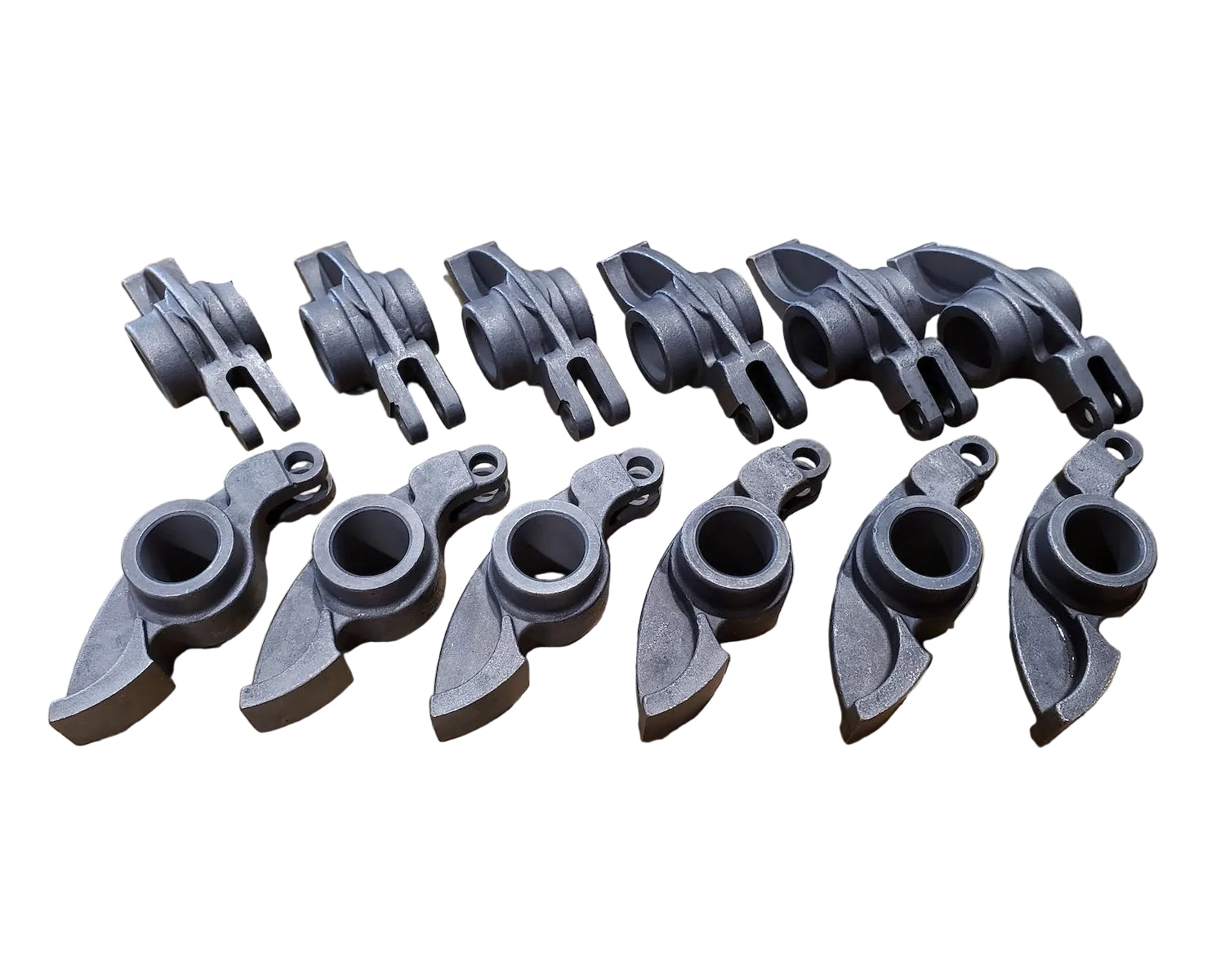 A set of 12 forged steel rocker arms for a BMW M30 engines made by KM Cams.