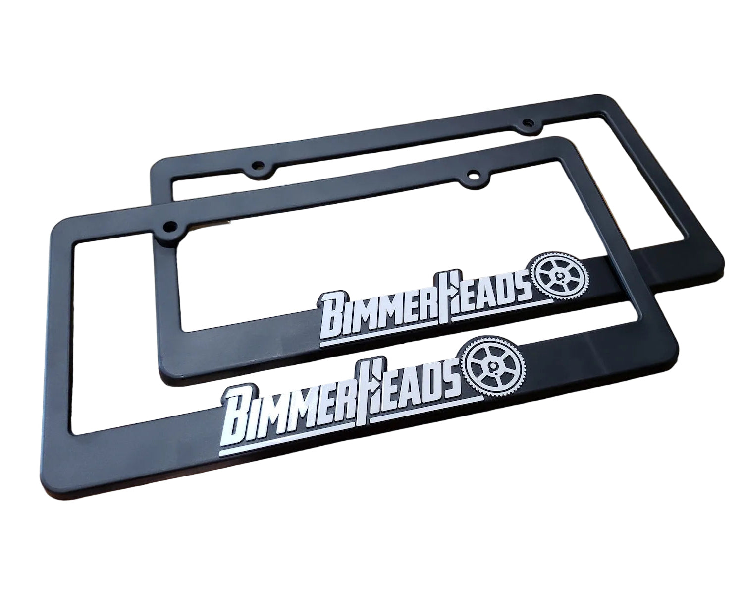 Two black plastic license plate frames with the BimmerHeads logo on them.