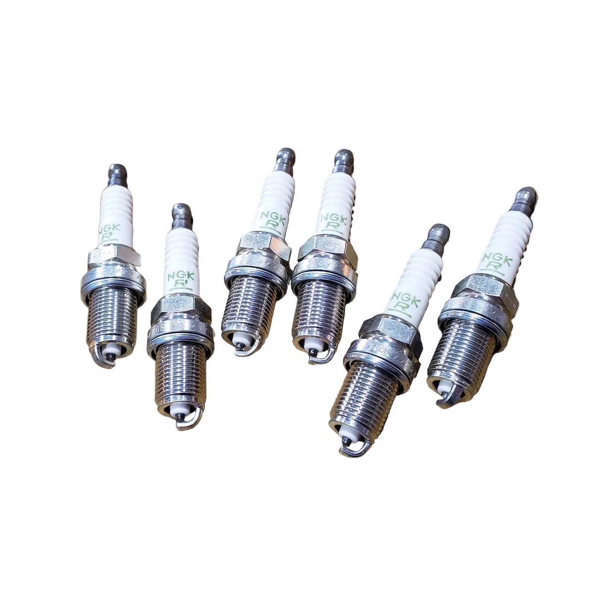 Set of 6 NGK spark plugs for BMW S50 and S52 engines.