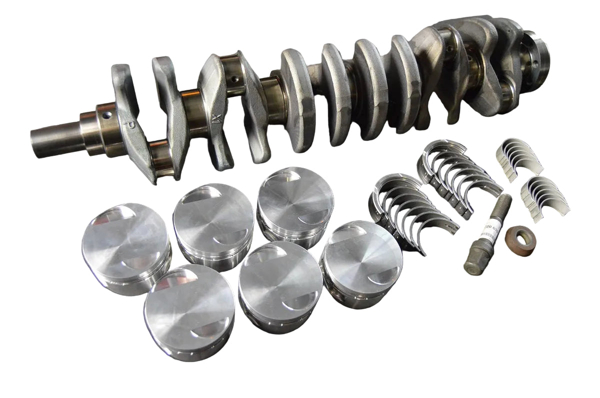 Complete stroker kit by BimmerHeads for BMW M20 engines shown with CP pistons and ACL bearings.