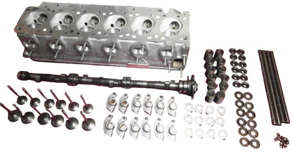 BimmerHeads BMW M30 performance cylinder head and parts laid out on table.